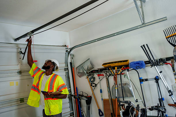 Professional Garage Door Panel Replacement technician working in Linn County County, IA